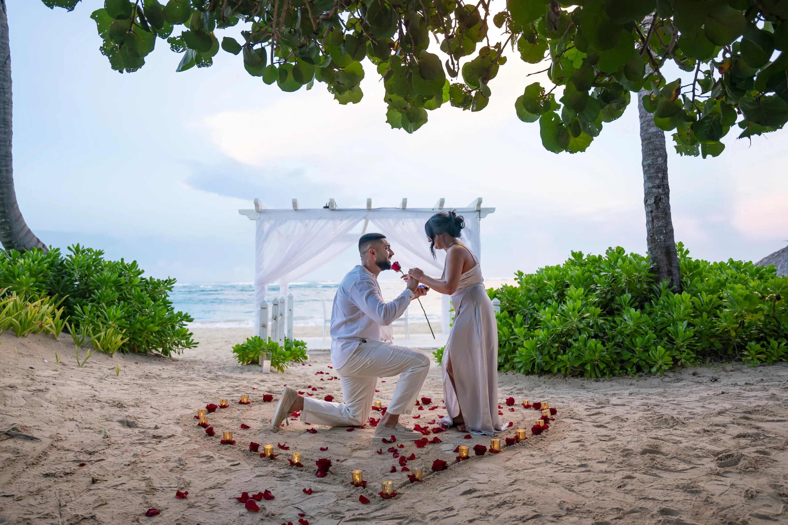 Boda married couples facing the sea